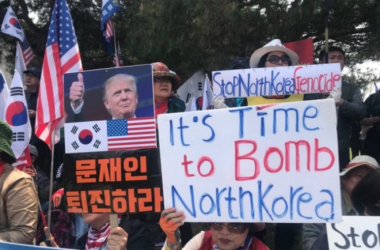 [From the scene] Rightwing protestors claim ‘time to bomb NK’