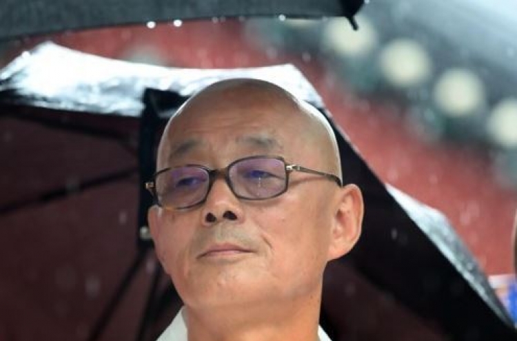 Prosecutors investigating spy agency's alleged surveillance of Buddhist monk