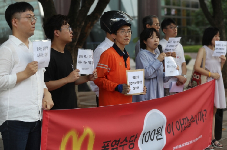 McDelivery riders protest stifling dress code