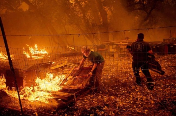 Firefighters make progress in California but weather not promising