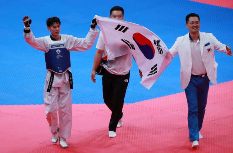 S. Korean taekwondo fighter Kim Tae-hun wins gold in men's 58kg