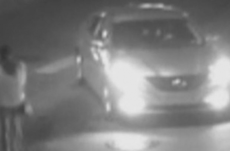 Suspect caught on CCTV ramming car into woman twice