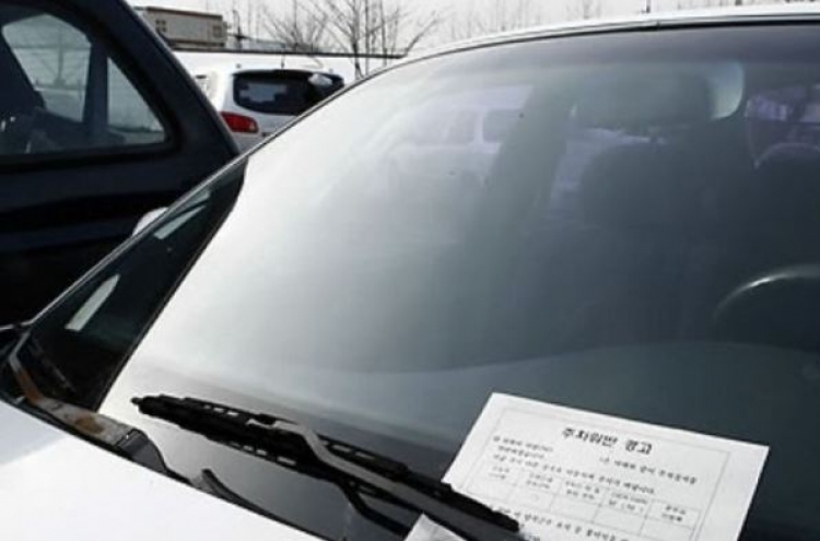 Car owner apologizes for tantrum over parking sticker