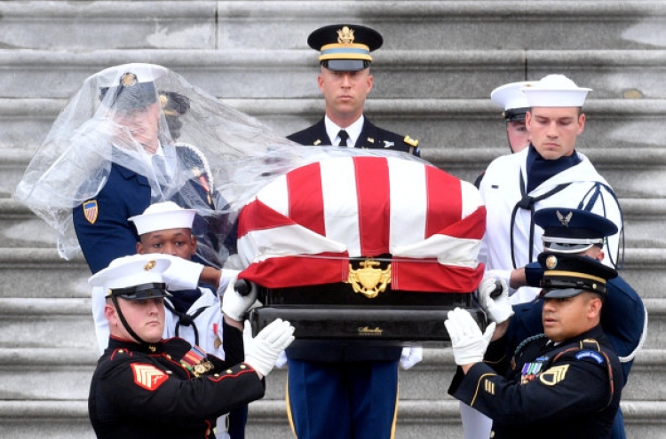 McCain ends 81-year journey with burial at Naval Academy