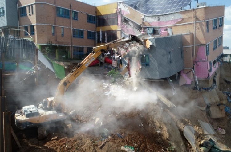 Authorities begin demolition of collapsing kindergarten