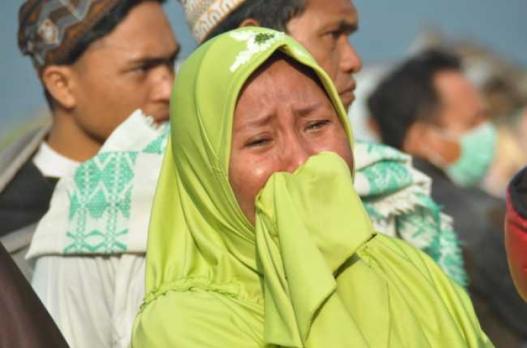 Hundreds killed in Indonesia quake-tsunami