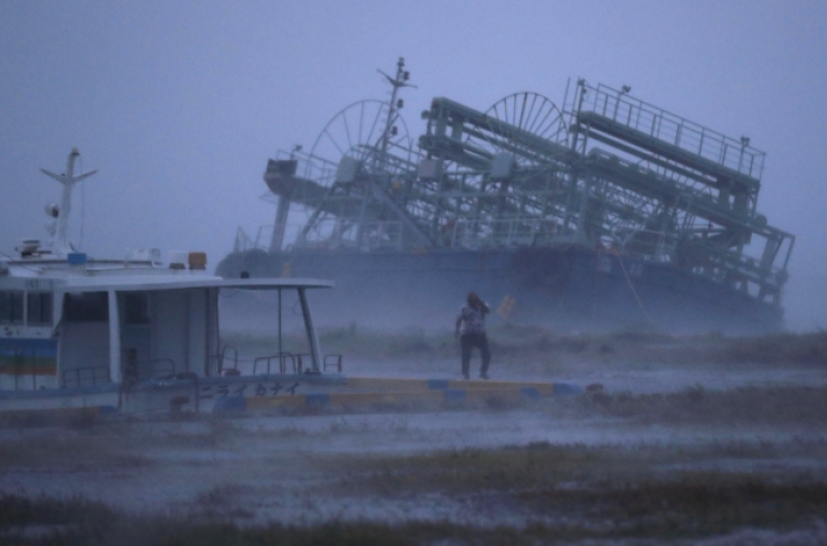 Typhoon pummels Japan; flights canceled, trains shut down