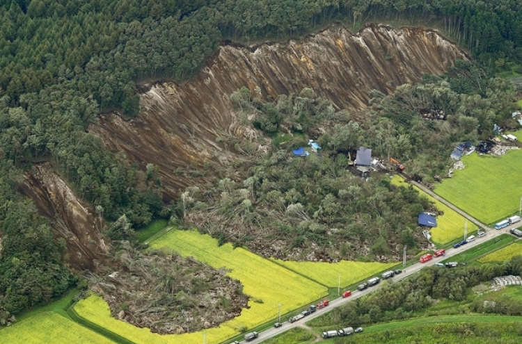 Quake shakes part of northern Japan hit by deadly landslides