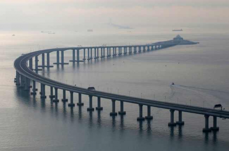 China opens mega bridge linking Hong Kong to mainland