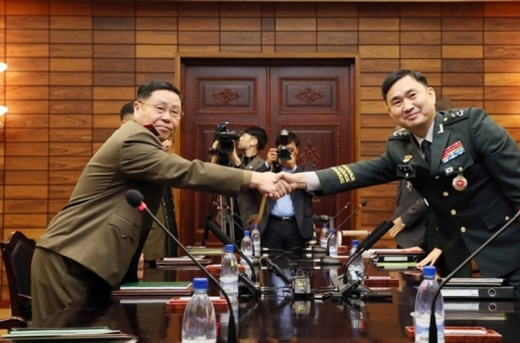 Koreas agree to verify removal of 22 guard posts next week