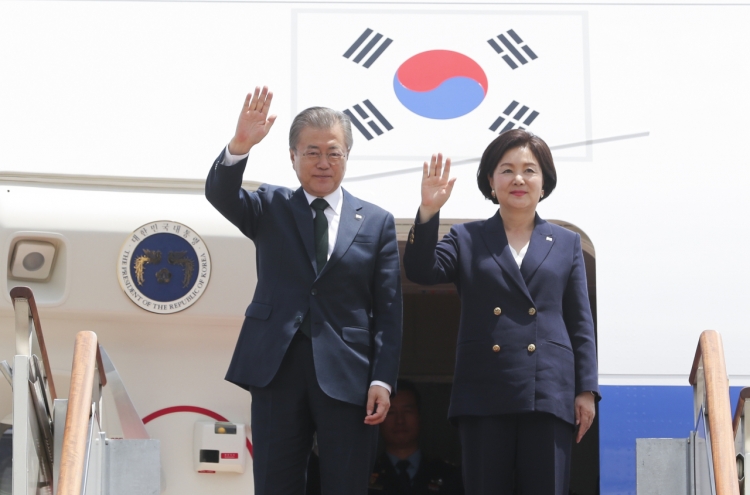 Moon back in Korea after Northern Europe trip