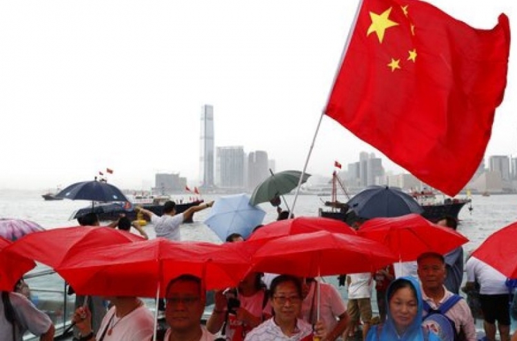 Hong Kong police seize explosives as rival camps rally