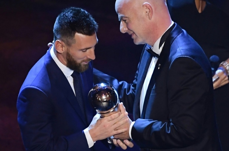 Messi wins FIFA player of the year as Ronaldo skips ceremony