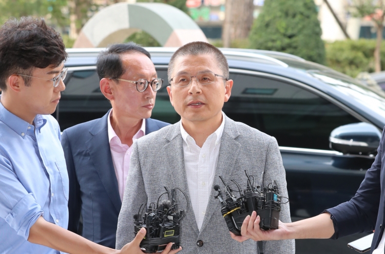 Opposition leader appears at prosecution office over 'fast-track' bills row