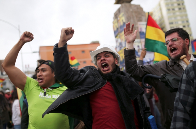 Bolivia's Morales resigns after losing backing of security forces