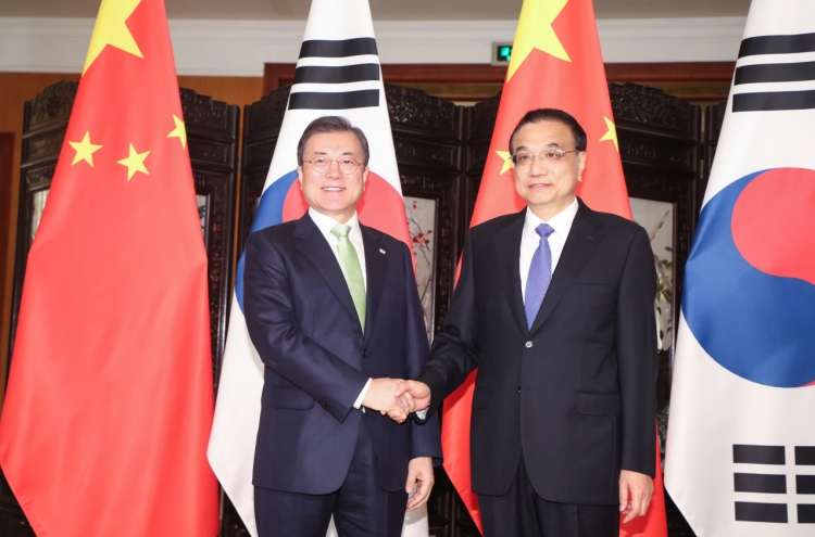 Moon, Li agree to facilitate follow-up FTA talks on service, investment sectors