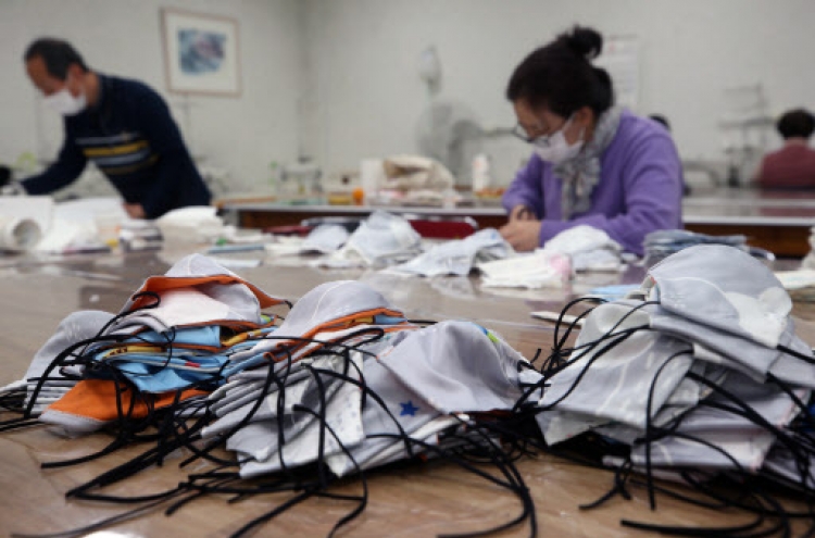 S. Korea curbs exports of facial masks amid soaring virus cases