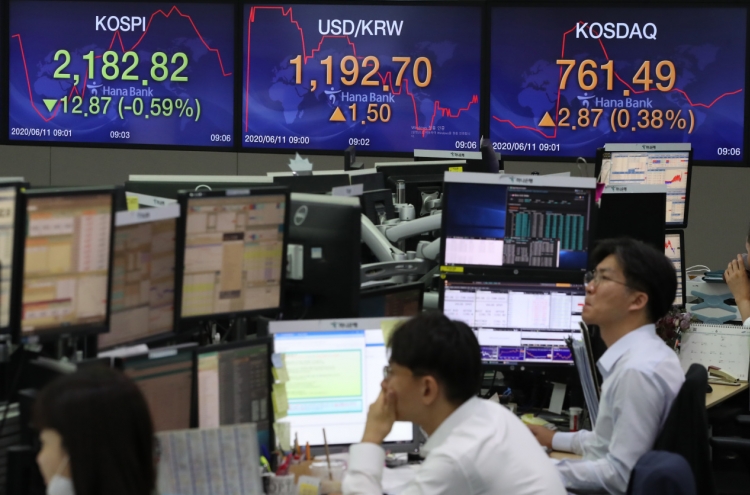 Seoul stocks open lower on Fed's gloomy forecast