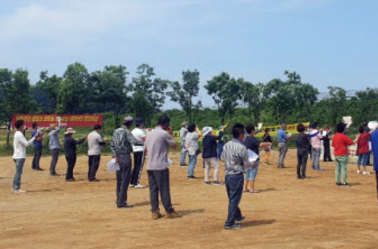 Defector group cancels plan to send bottles containing rice to NK amid heightened tensions