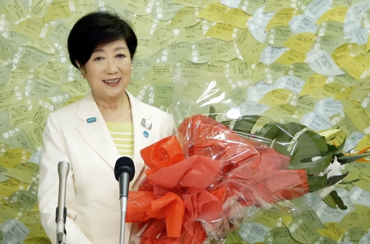 Tokyo governor wins 2nd term, buoyed by handling of virus
