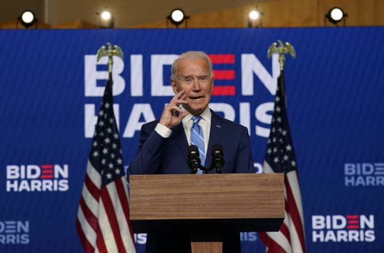 Biden wins Michigan, Wisconsin, now on brink of White House