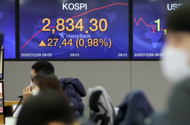 Seoul stocks open higher on chip gains