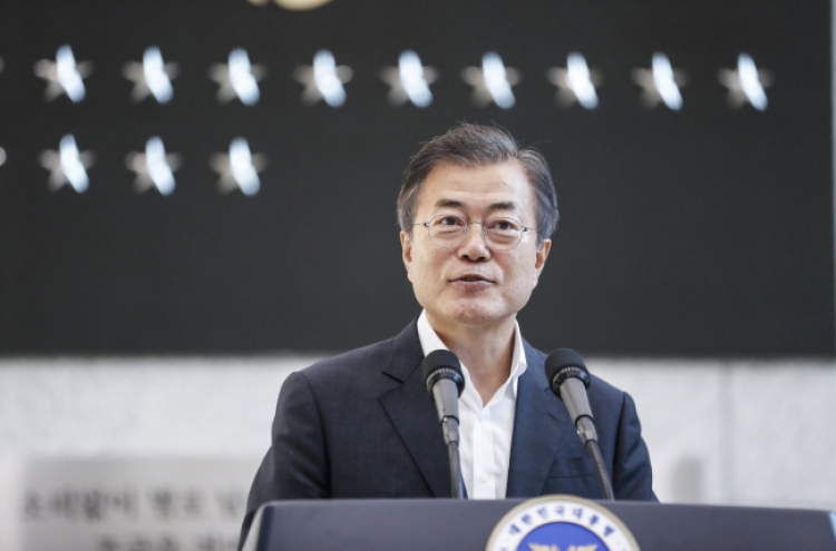 Moon visits S. Korea's spy agency for briefing on its reform steps