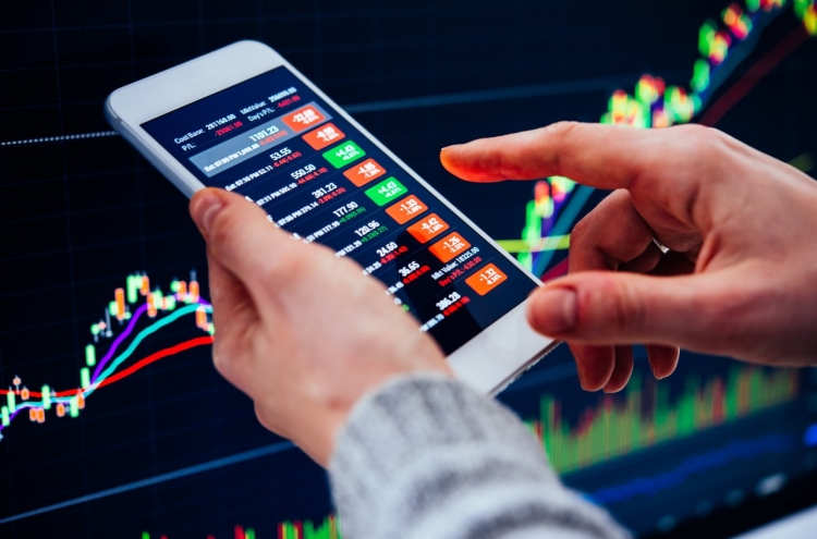 Daily mobile stock trading volume surges 220% in 2020