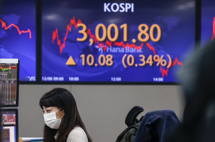 Seoul shares open lower on ex-dividend date