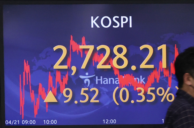 Seoul shares end higher on chip advance