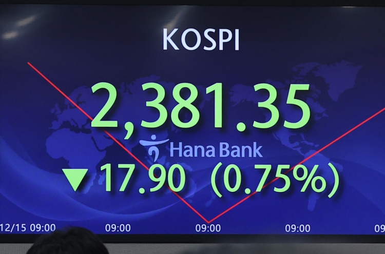 Seoul shares open lower on Fed's hawkish stance