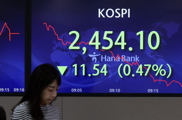 Seoul shares open lower amid rate hike worries