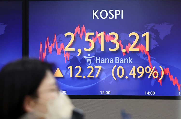 Seoul shares end higher amid rate hike woes