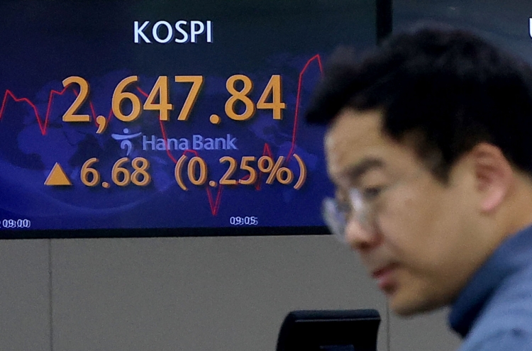 Seoul shares open tad higher ahead of Fed meeting