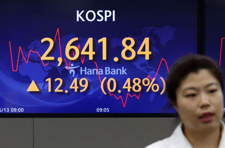 Seoul shares open higher on hopes for Fed's rate pause