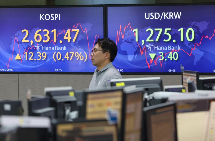Seoul shares open higher after Fed rate pause