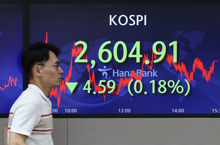 Seoul shares edge down after China's moderate rate cut