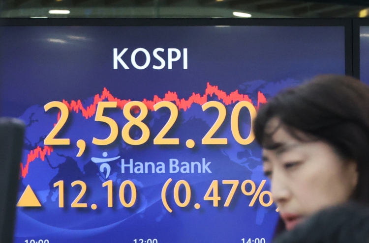 Seoul shares end higher on tech, auto gains