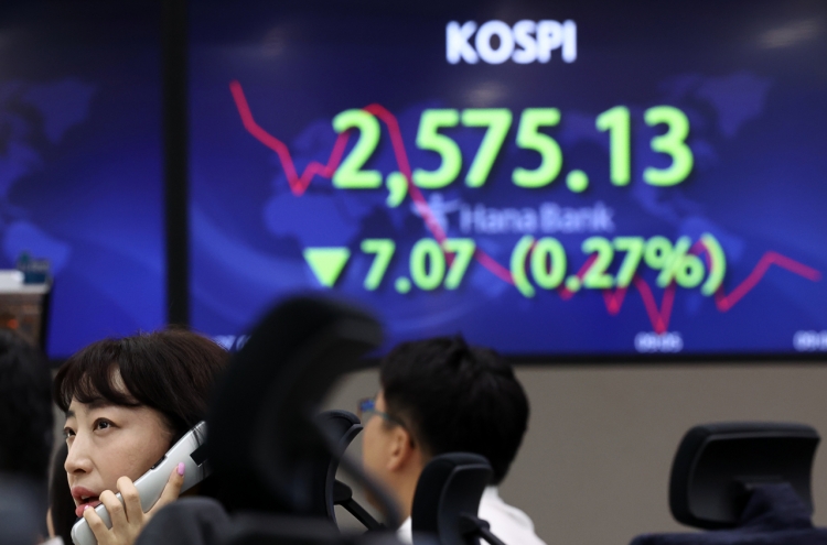 Seoul shares open lower on weak techs ahead of Powell remarks