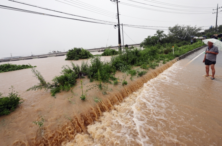 At least 22 dead, 14 missing, as torrential rains batter Korea