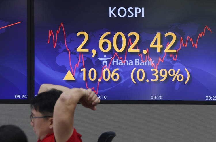 Seoul shares end higher on chip rally