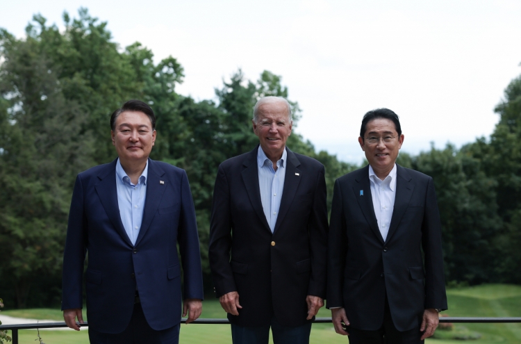 Yoon returns home from Camp David summit with Biden, Kishida