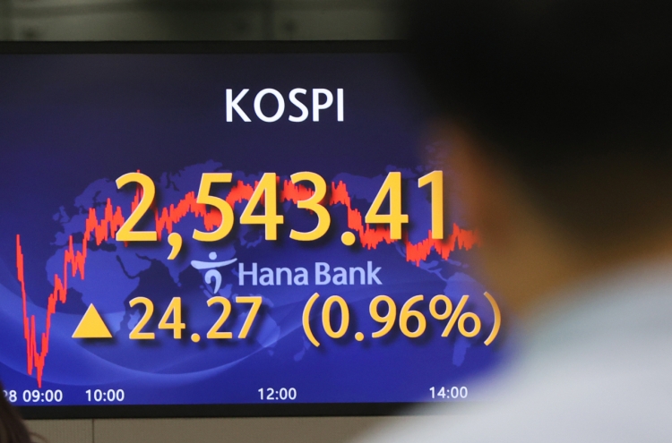 Seoul shares open up on US gains ahead of key economic data