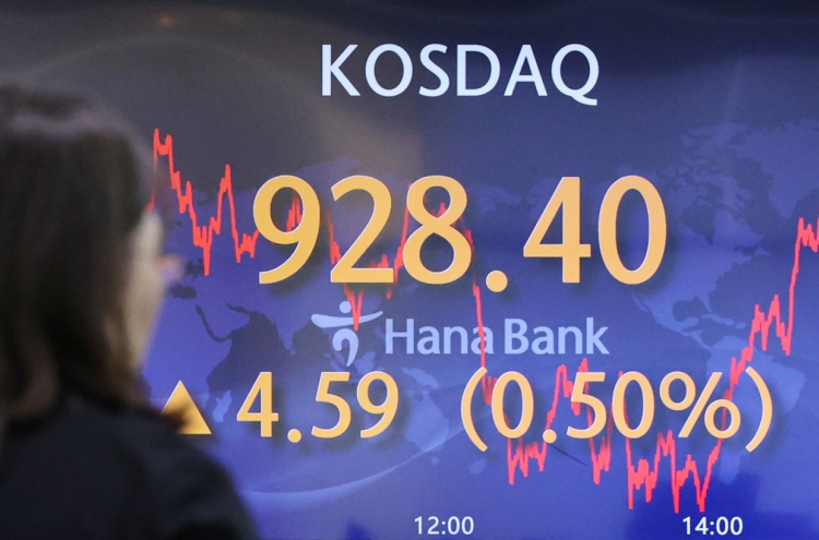 Seoul shares open nearly flat amid rate pause prospects