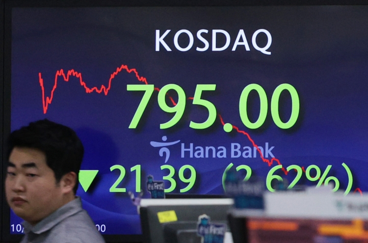 Seoul shares open higher on US gains after Fed comments