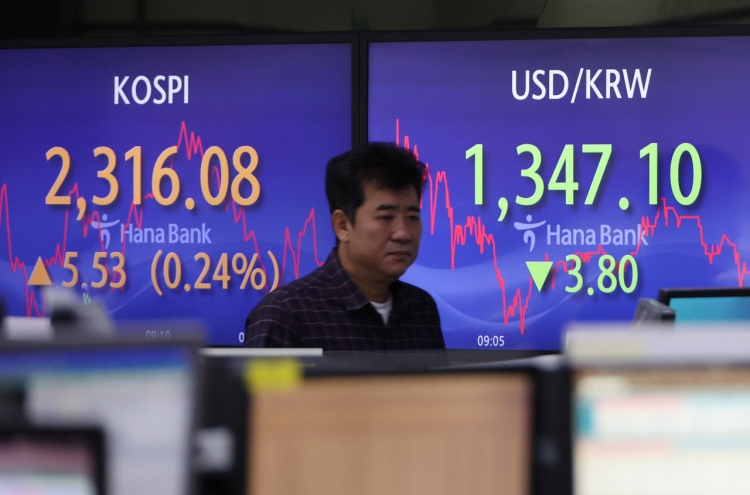 Seoul shares open higher on US gains