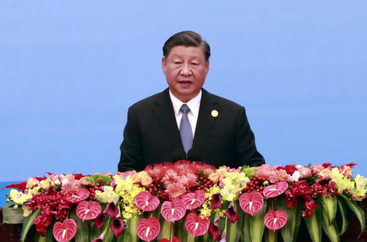 Xi says 'willing to make bigger contributions' in letter to NK leader