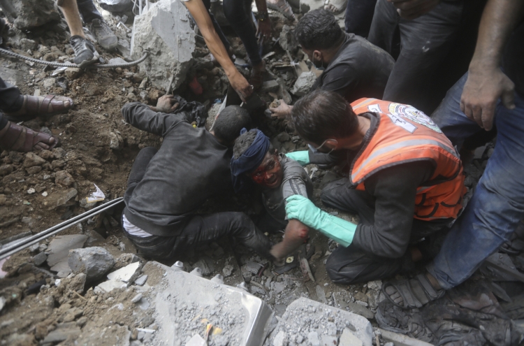 Following an Israeli airstrike, crowded Gaza hospital struggles to treat wounded children