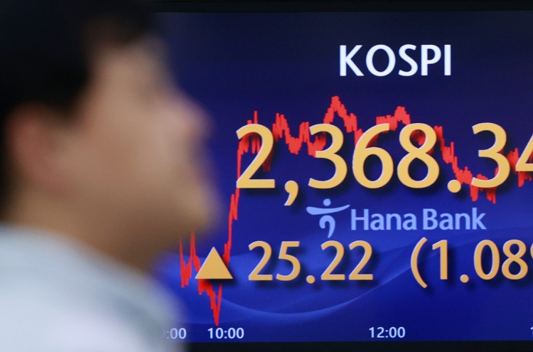 Seoul shares open higher on stock short selling ban