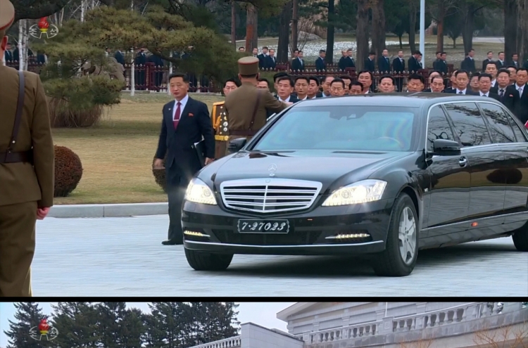 N. Korean officials show up for year-end party meeting in luxury sedans